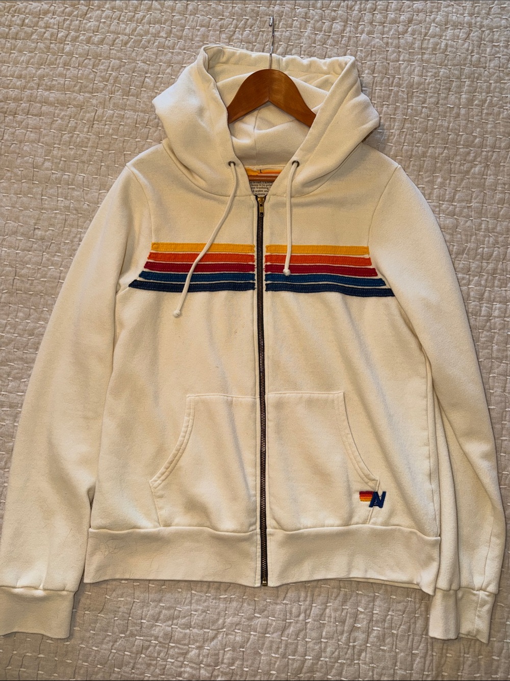 Aviator Nation Cream Hoodie with Red Orange Navy Stripes and Yellow Accent